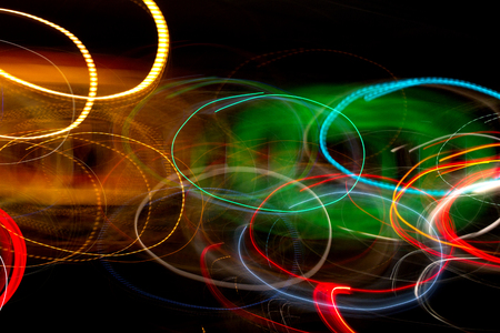 colorful circles obtained by moving the multi-colored lights of the night city