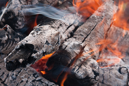 burning fire from thick bushes, visible fire and rising smokeの写真素材