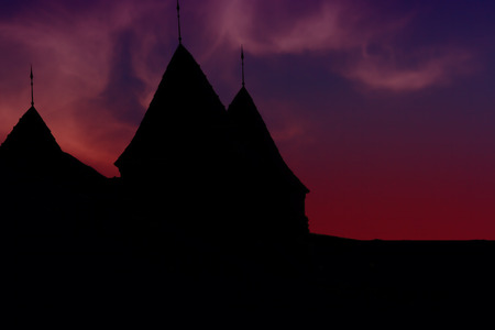 Old city in Warsaw against the background of the dark sky after sunsetの写真素材