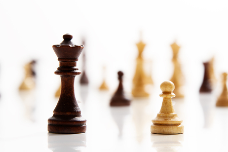 Business concept - chess - white pawn against a black king - competitionの写真素材