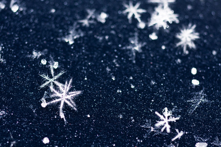 interesting patterns on frozen blue iceの写真素材