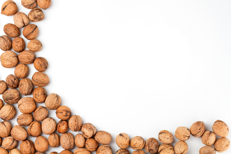 walnut sprinkled on a white background, isolatedの写真素材