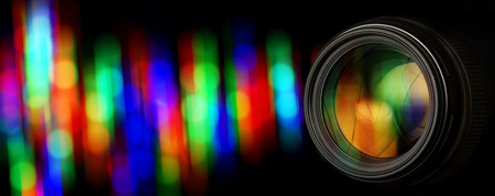 Photo lens and black background with individual light blurの写真素材