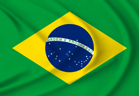The Brazilian flag waving from the wind, proudly fluttering in the windの写真素材