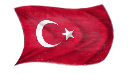The flag of Turkey waving from the wind, proudly fluttering in the wind  with traces of use in battle and destruction from difficult warfareの写真素材