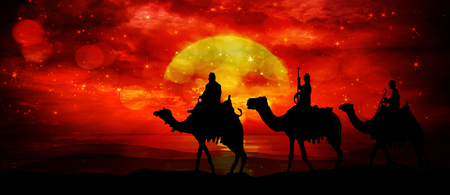 Three kings - wandering in the desert in the light of the setting sun and flashes in the sky