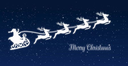 Santa's sleigh pulled by four reindeers against the night sky with stars and Merry Christmas letteringの写真素材