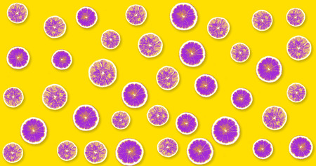 Background with pink lemons on a yellow backgroundの写真素材