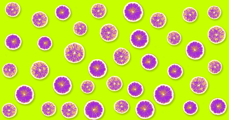 Background with pink lemons on a lime color backgroundの写真素材