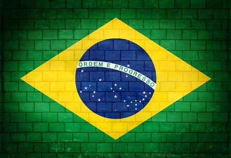 Brazil flag painted on an old brick wallの写真素材