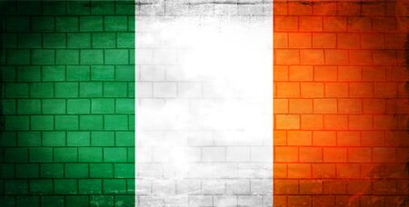 Irish flag painted on an old brick wallの写真素材