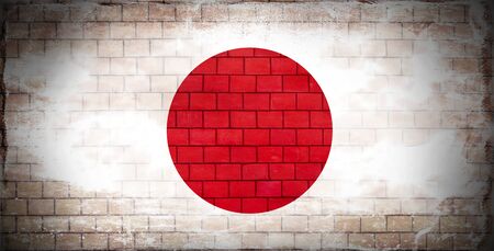 Japanese flag painted on an old brick wallの写真素材