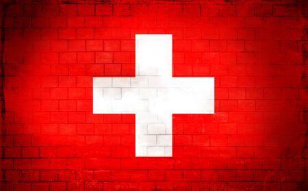 Swiss flag painted on an old brick wallの写真素材