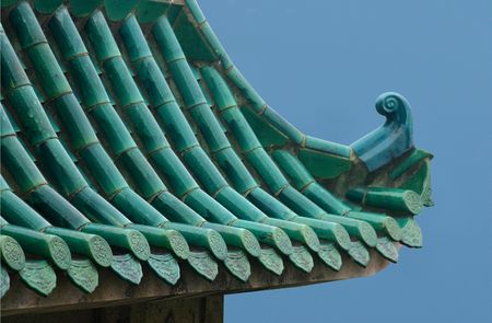 Chinese temple roof isolated on blue