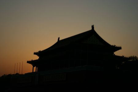 Sunset over the main entry gates of the Forbidden City - Beijingの写真素材