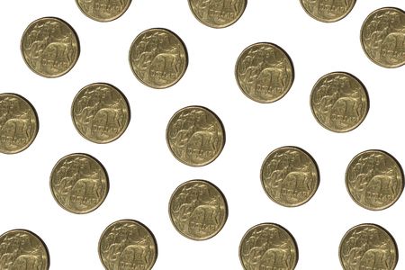 Australian one dollar coins isolated on whiteの写真素材