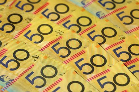 Closeup of many Australian 50 dollar notes. Shallow depth of fieldの写真素材