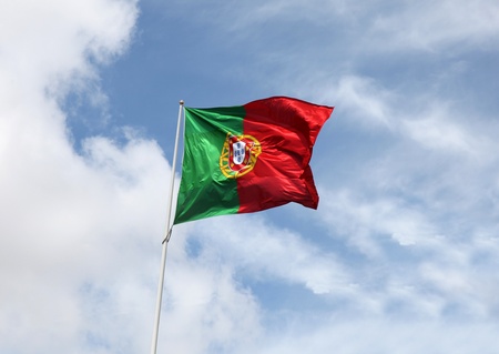 A Portuguese flag flying in the wind.の写真素材