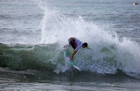 MEREWETHER AUSTRALIA - FEBRUARY 17: Conner Oleary from Australia surfing in the Burton Toyato Pro Junior professional surfing event at Merewether Beach. Feb. 17, 2013 Merewether, Australia.のeditorial素材