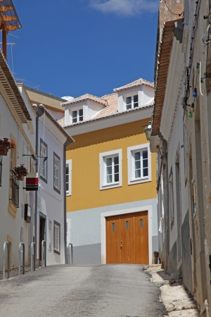 A traditional street scene in Lagos Portugal. This coastal town is a popular tourist destinationの写真素材