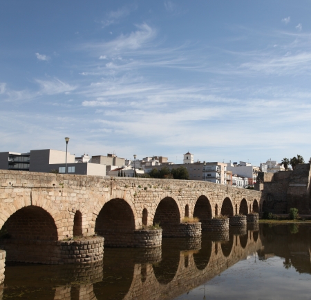 Puente Romano is a Roman Arch Bridge in the town of Merida Spain.の写真素材
