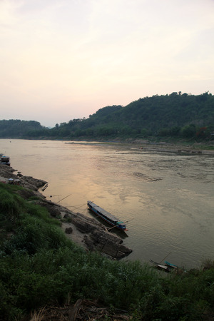 The Mekong River at dusk at Laung Prabang Laosの写真素材