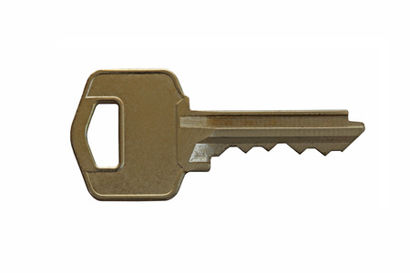 A metal key isolated on white.の写真素材