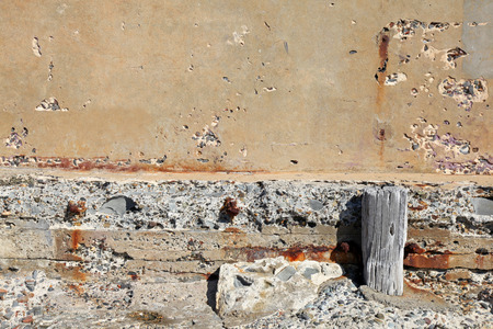 A weathered and crumbling concete wallの写真素材