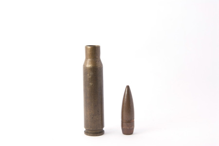Disassembly bullet machine gun isolated white backgroundの写真素材