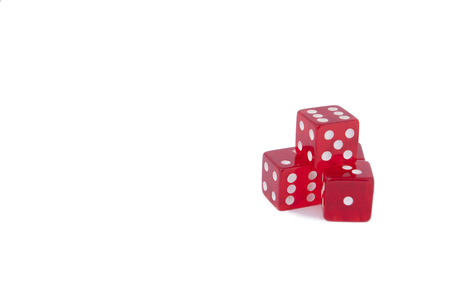 Staked Four white isolated background red dicesの写真素材