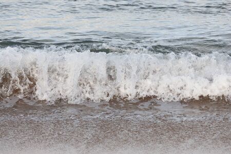 Golden Sand and Clear Waterの写真素材
