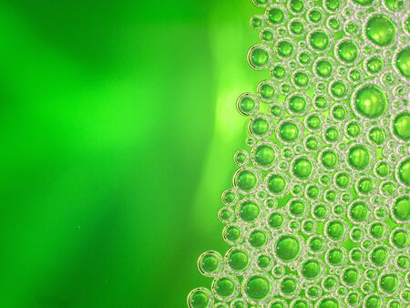 Neon green liquid pumps. Abstract backgroundの写真素材