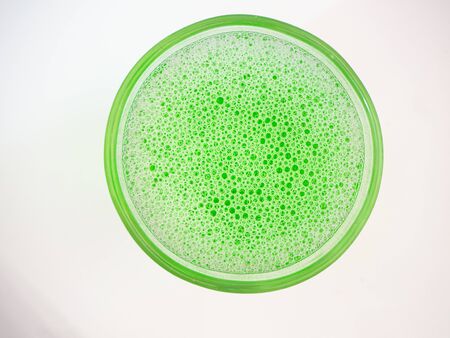 Neon green liquid pumps. Abstract backgroundの写真素材