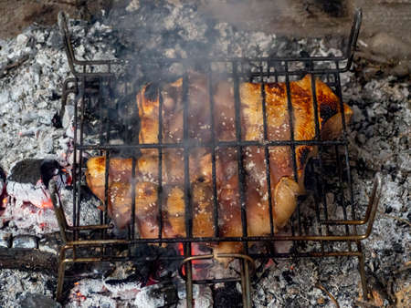 Good Tasty Barbecue Pork chops on a grillの写真素材