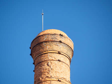 Brick chimney from an old abandoned factoryの写真素材
