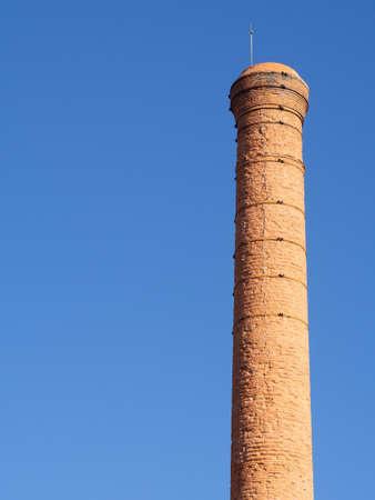 Brick chimney from an old abandoned factory