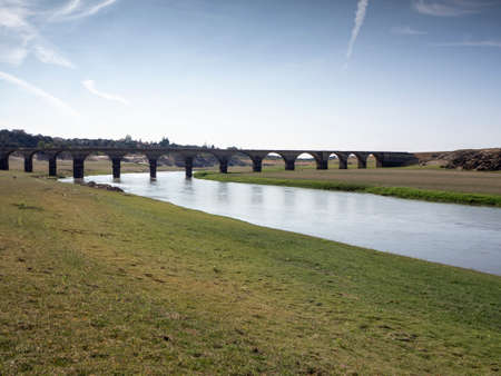 Reservoir with drought at the Star Bridge. Concept of climate changeの写真素材