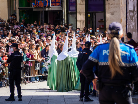 Zamora, Spain - April 14, 2022: Policewoman in an Easter Week procession in Spain