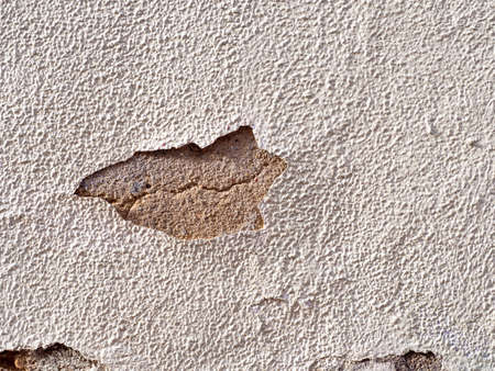 Cement wall scratched because it is very oldの写真素材