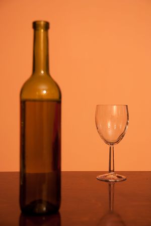 bottle with empty glass - alcohol addiction conceptの写真素材