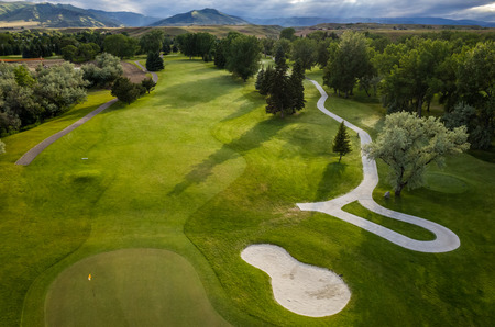 Aerial view of a beautiful green golf course.の写真素材