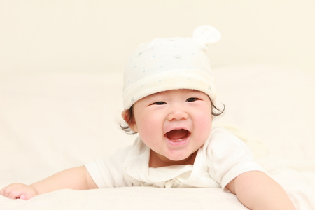 baby in a good moodの写真素材