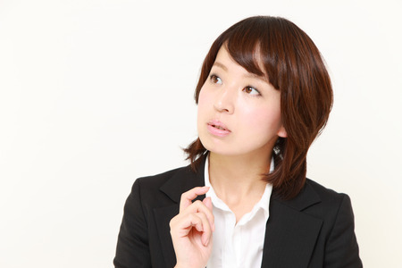  Japanese businesswoman thinks about somethingの写真素材