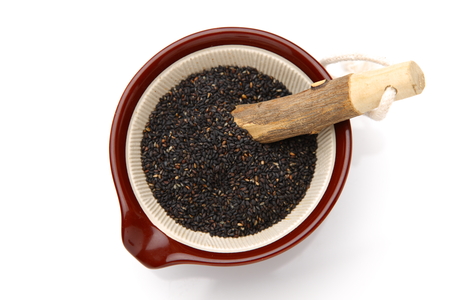 Black sesame seed in Japanese mortarの写真素材