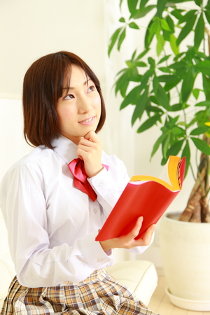 female high-school student dreaming at her futureの写真素材