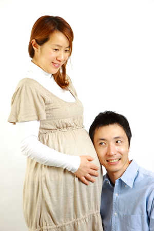 pregnant coupleの写真素材