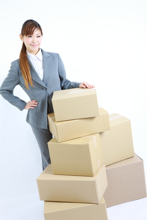 buisiness woman with Cardboard boxesの写真素材