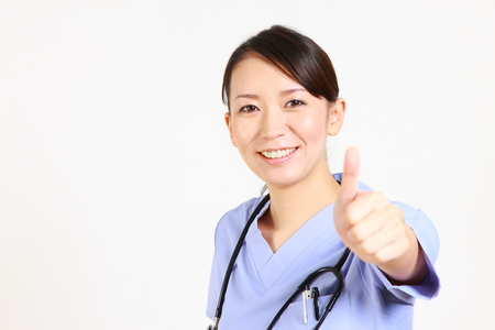 young Japanese female doctor succeedsの写真素材