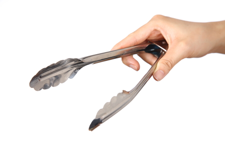 hand with Tongsの写真素材