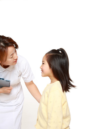 Nurse Talks To A Child Patientの写真素材